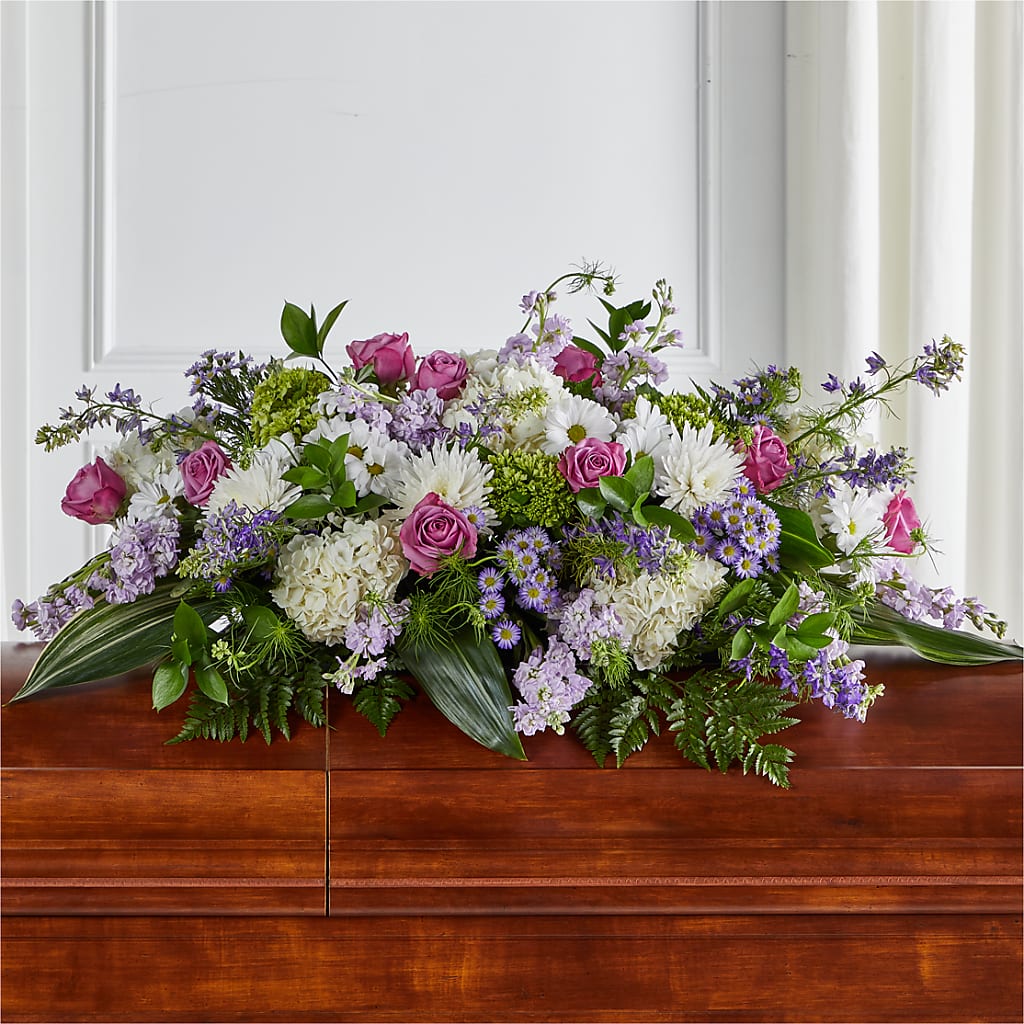 Meadows of Serenity Casket Spray – TREASURE HUT FLOWERS GIFTS & GHSES, Delavan WI