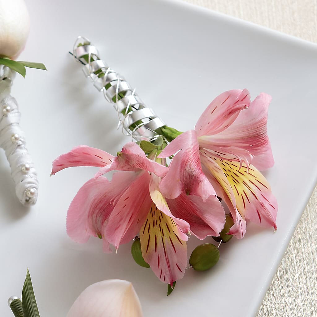 Pink Peruvian Lily Boutonniere – TREASURE HUT FLOWERS GIFTS & GHSES, Delavan WI