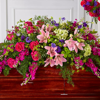 Radiant Tribute Casket Spray – TREASURE HUT FLOWERS GIFTS & GHSES, Delavan WI